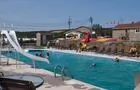 Piscine chauffée jeux d'eau et amusements&nbsp;&nbsp;&nbsp;&copy; Camping KOA Bas-St-Laurent