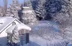 Chalet et moulin en hiver