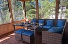 Profitez de cet espace à l'abris des moustiques pour prolonger vos soirées à extérieur !&nbsp;&nbsp;&nbsp;&copy; Chalet Sea Brise