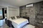 Chambre et lit&nbsp;&nbsp;&nbsp;&copy; LOFT URBAIN AMQUI