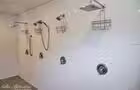 DOUCHE COMMUNAUTAIRE © Photographe: Gilles Thibodeau