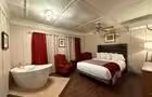 Chambre 1 avec balcon © Auberge La Grande Maison