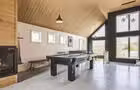 Billard, soccer sur table et jeux de société. © Chalets Sô Lodges inc.