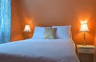 Chambre avec lit double © Chalets Booking